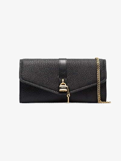 Shop Chloé Black Aby Leather Clutch Bag