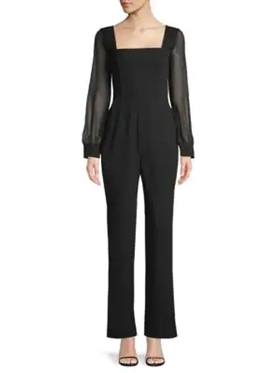 Shop Bcbgmaxazria Long-sleeve Jumpsuit In Black