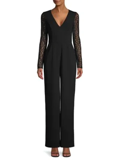 Shop Bcbgmaxazria Lace Long-sleeve Jumpsuit In Black