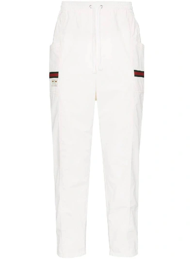 Shop Gucci Logo Band Track Pants In White