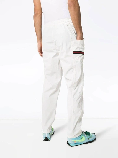 Shop Gucci Logo Band Track Pants In White