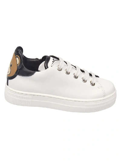 Shop Moschino Bear Patch Sneakers In Bianco Nero