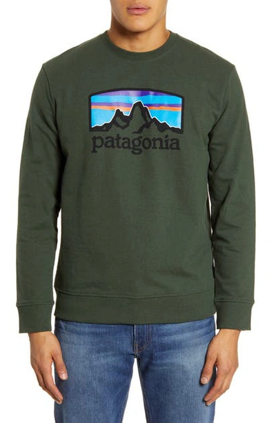 Shop Patagonia Fitz Roy Horizons Uprisal Recycled Blend Fleece Sweatshirt In Alder Green