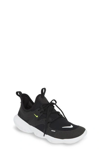 Shop Nike Free Run 5.0 Sneaker In Black/ White-anthracite-volt