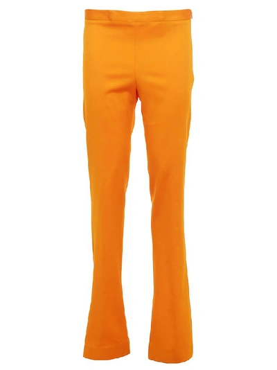 Shop Versace Flared Pants In Orange