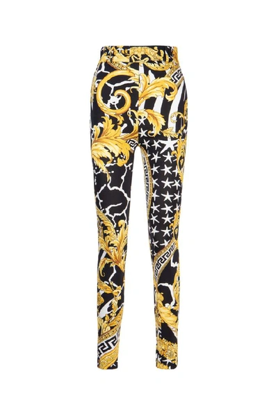 Shop Versace Printed High Waisted Skinny Trousers In Multi