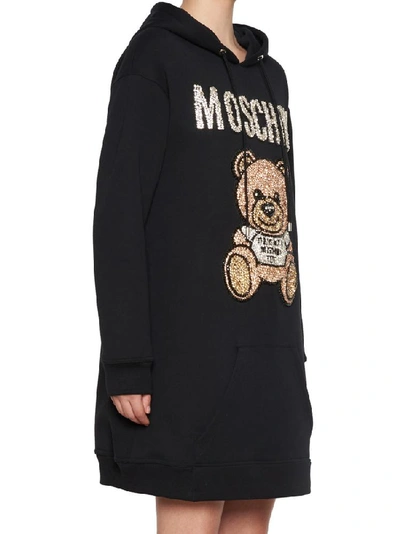 Shop Moschino Teddy Hooded Dress In Black