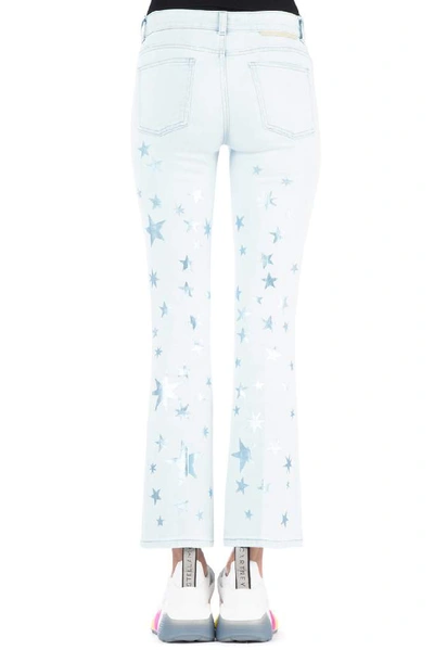 Shop Stella Mccartney Flared Star Print Jeans In Blue