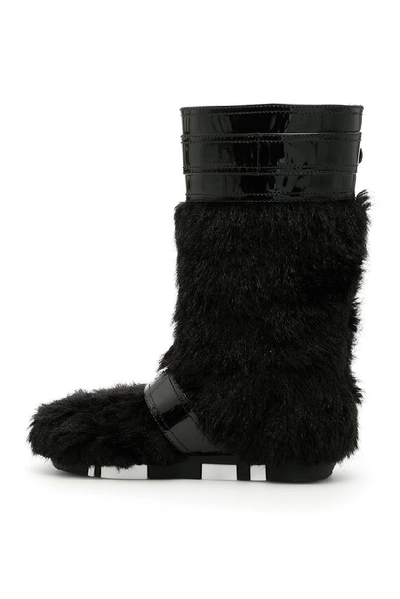Shop Miu Miu Buckled Faux Fur Boots In Black