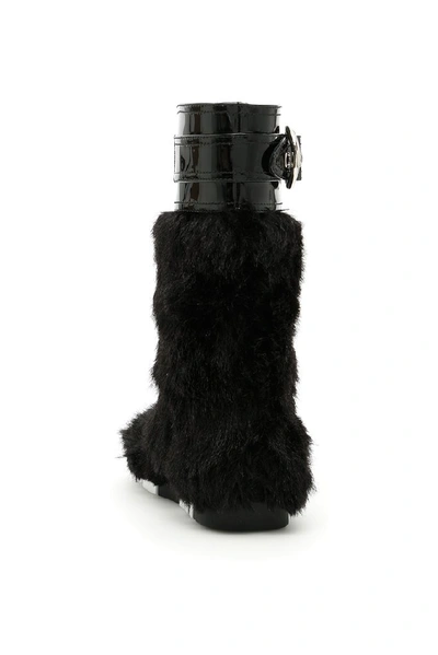 Shop Miu Miu Buckled Faux Fur Boots In Black