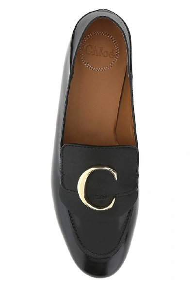 Shop Chloé C Plaque Loafers In Black