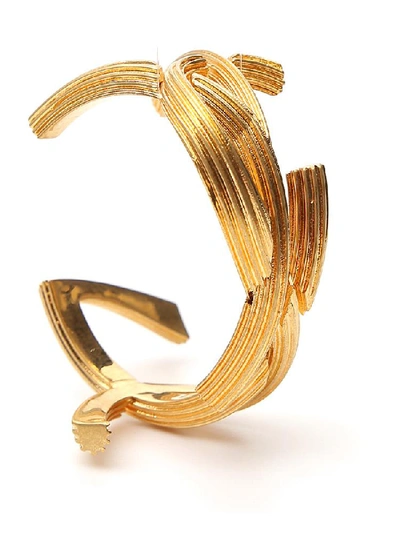 Shop Saint Laurent Braided Monogram Cuff In Gold