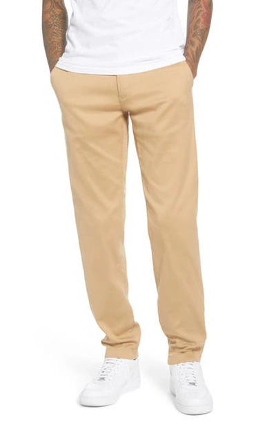 Shop Tommy Hilfiger Tapered Tech Twill Slim Fit Chino Pants In Beige