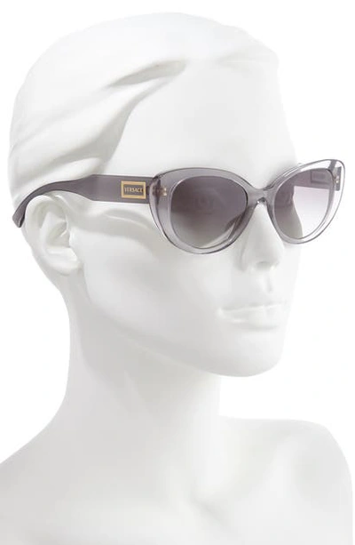 Shop Versace 54mm Cat Eye Sunglasses In Transparent Grey/ Grey