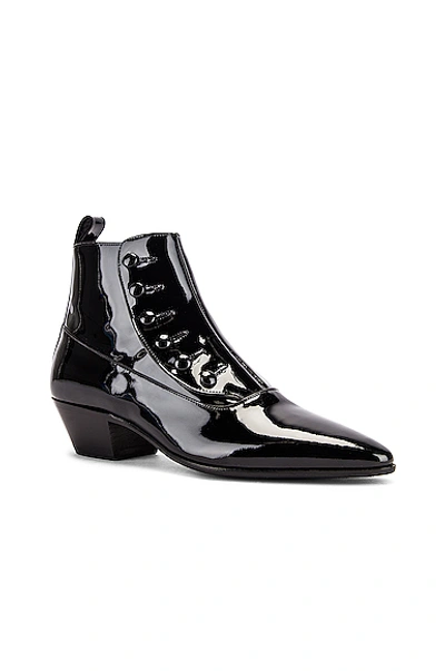 Shop Saint Laurent Belle Button Ankle Boots In Black