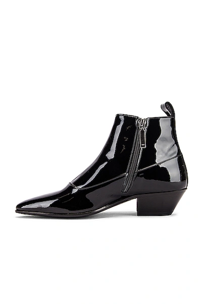 Shop Saint Laurent Belle Button Ankle Boots In Black