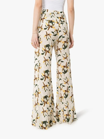 Shop Adriana Degreas Orchid Print Flared Trousers In White