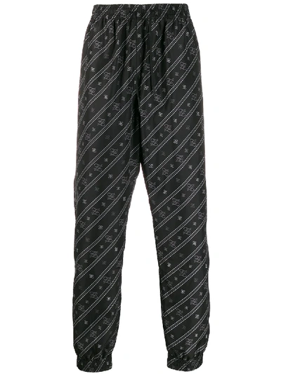 Shop Fendi Karligraphy Striped Track Pants In 黑色