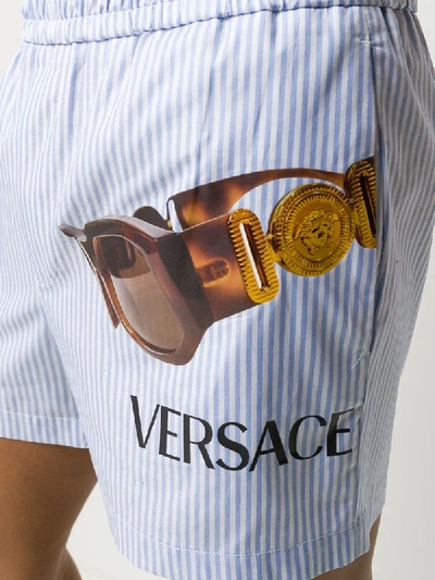 Shop Versace Graphic Print Shorts In Blue