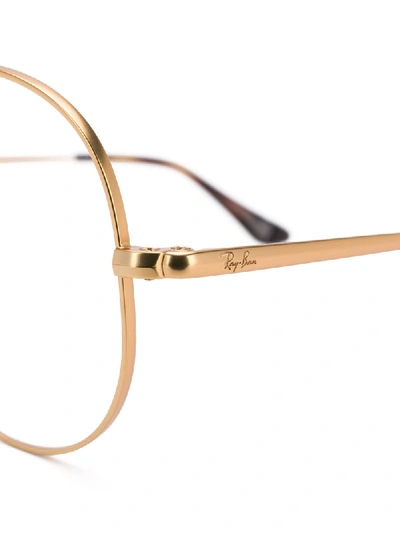 Ray Ban Oversized Round Frame Glasses In Gold