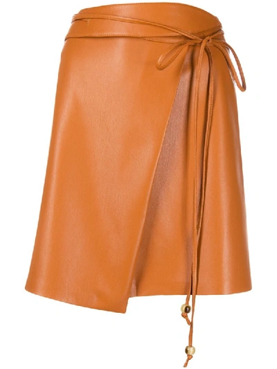 Shop Nanushka Sekoya Faux-leather Wrap Skirt In Brown