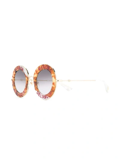 Shop Gucci Abstract Pattern Round Frame Sunglasses In Brown