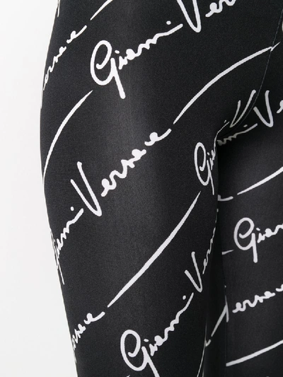Shop Versace Logo Print Leggings In Black