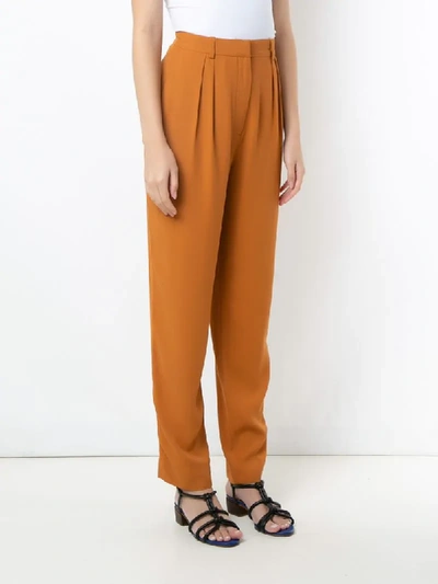 Shop Andrea Marques Pleated Tapered Trousers In Brown