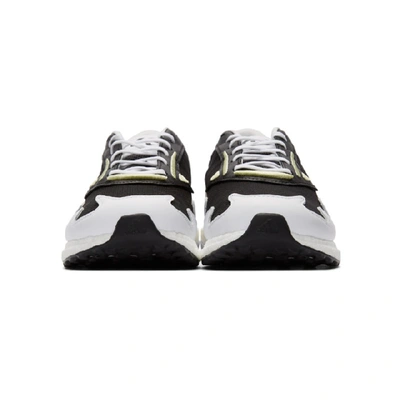 Shop Y-3 Black And White Rhisu Run Sneakers In Black/ftwrw