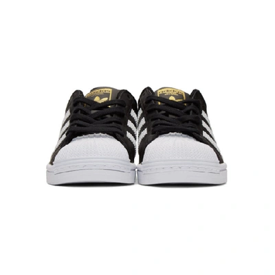 Shop Adidas Originals Black And White Superstar Sneakers In Black/wht