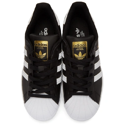 Shop Adidas Originals Black And White Superstar Sneakers In Black/wht