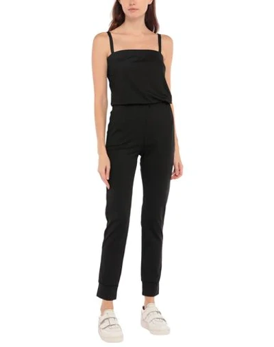 Shop Moschino Jumpsuit/one Piece In Black