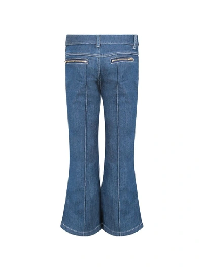 Shop Chloé Blue Denim Flared Jeans For Girl