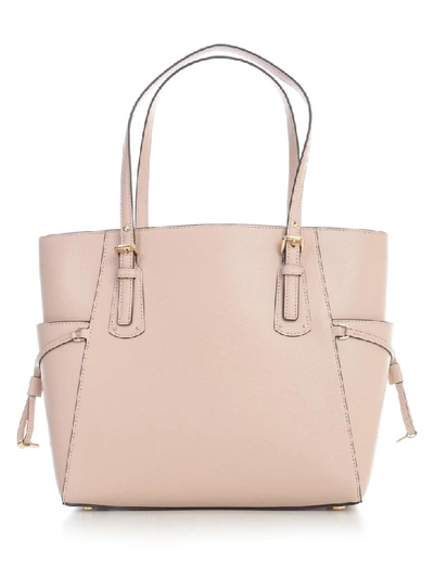 Shop Michael Michael Kors Voyager Ew Tote In Soft Pink