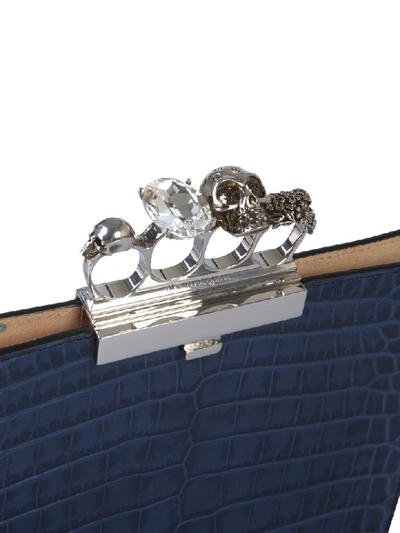 Shop Alexander Mcqueen Four-ring Jeweled Clutch In Blu
