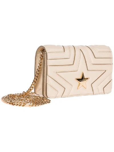 Shop Stella Mccartney Stella Star Crossbody Bags In Beige