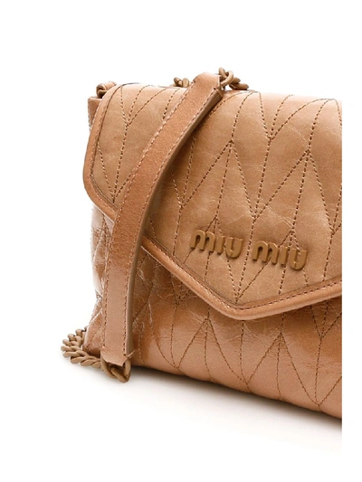 Shop Miu Miu Quilted Shine Calfskin Bag In Cammeo (beige)