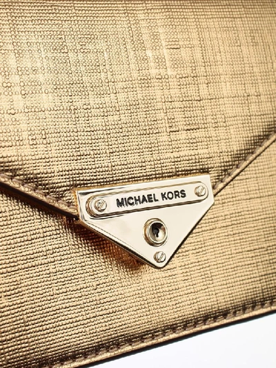 Shop Michael Michael Kors Loulou Md Envelope Clutch In Pale Gold