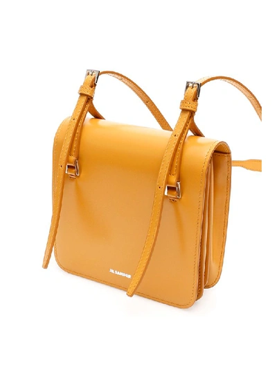 Shop Jil Sander Holster Mini Bag In Dark Yellow (beige)