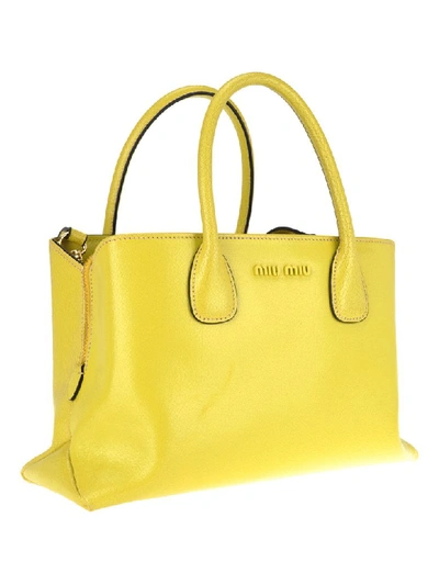 Shop Miu Miu Top Handle Bag In Sole