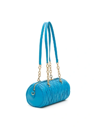 Shop Miu Miu Matelasse Cylinder Bag In Voyage (light Blue)