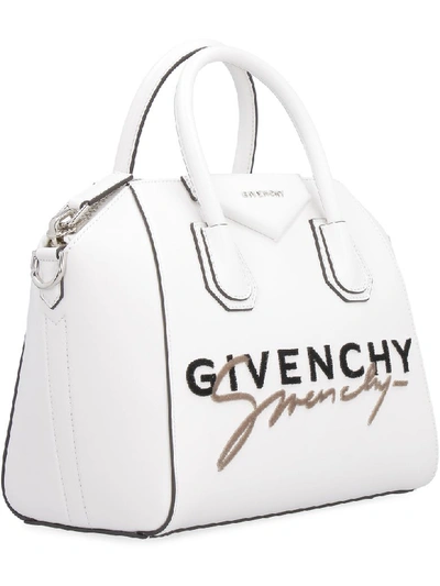 Shop Givenchy Antigona Leather Handbag In White