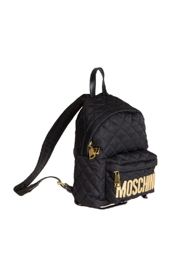 Shop Moschino Quilted Logo Backpack In Nero/oro