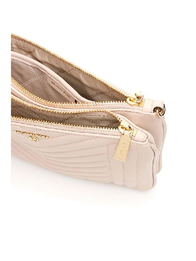 Shop Michael Michael Kors Jet Set Charm Clutch In Soft Pink (pink)