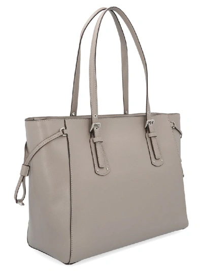 Shop Michael Kors Voyager Bag In Pearl Grey