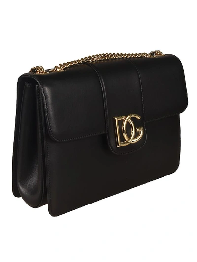 Shop Dolce & Gabbana Interlocking Dg Shoulder Bag In Black