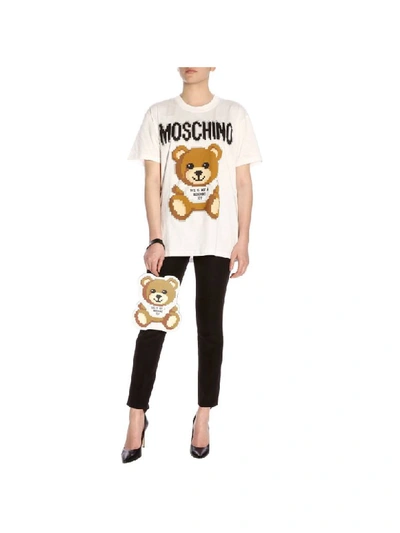 Shop Moschino Clutch Capsule Collection Pixel Clutch Bag With Teddy In White