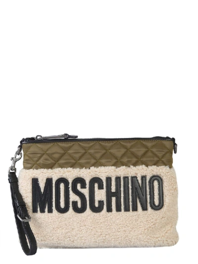 Shop Moschino Quilted Clutch In Multicolor