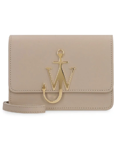 Shop Jw Anderson Anchor Logo Leather Crossbody Bag In Beige