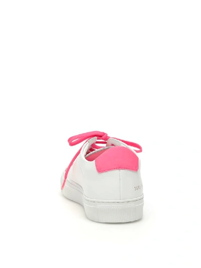 Shop Common Projects Retro Low Fluo Sneakers In White Pink (white)